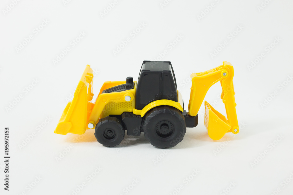 Yellow Tractor Loader Toy on white background isolation image.. Yellow Tractor Loader Toy on white background isolation image..
