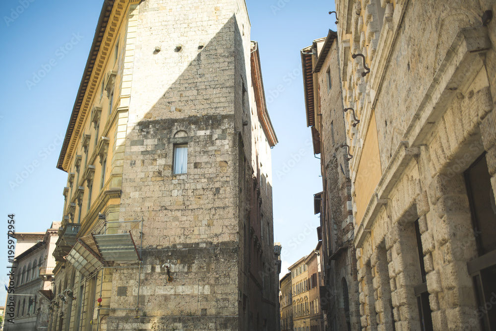 Old houses in historical quarter of Siena