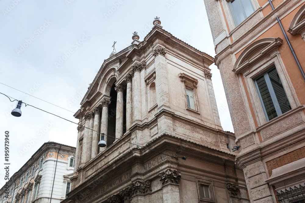 Classical architecture building facade with columns in Rome