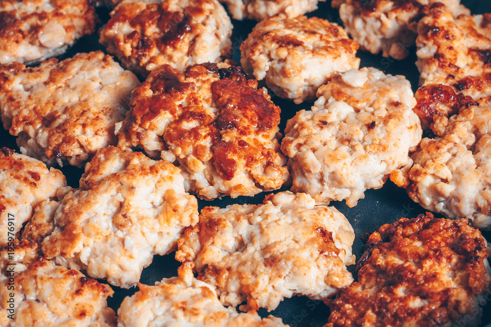 Cooking in a frying pan, fry chicken cutlets Cooking in a frying pan, fry chicken cutlets