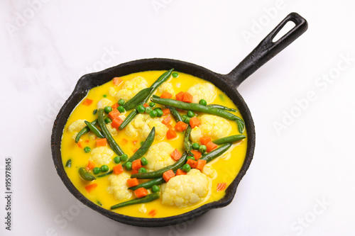 Indian Vegetarian curry Vegetable Korma. Copyspace, top view