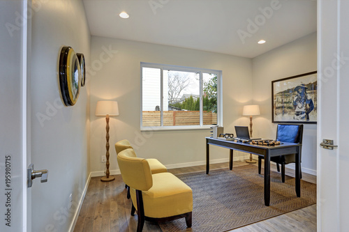 Modern home office design with yellow and blue accents