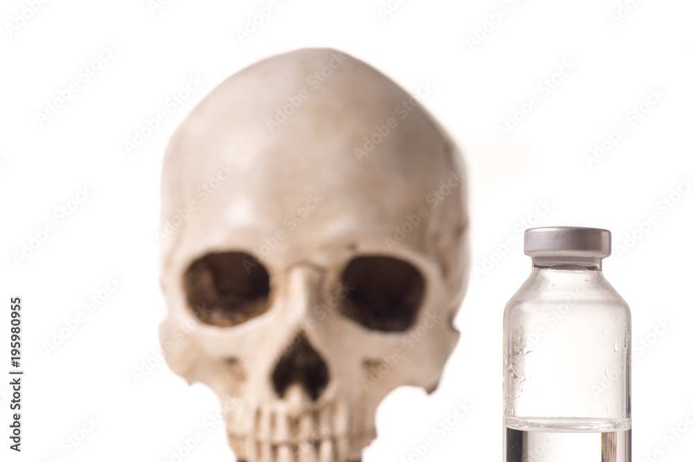 Obraz premium Medical vials and skull