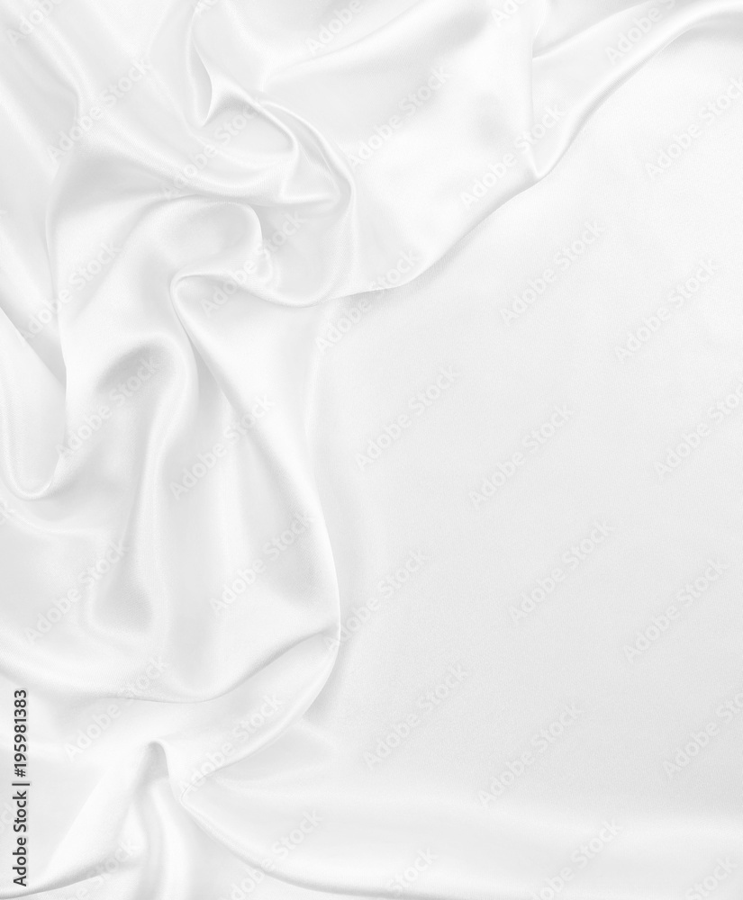 Smooth elegant white silk or satin luxury cloth texture as wedding background. Luxurious Christmas background or New Year background design Smooth elegant white silk or satin luxury cloth texture as wedding background. Luxurious Christmas background or New Year background design