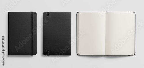 Photorealistic black leather notebook mockup on light grey background. photo