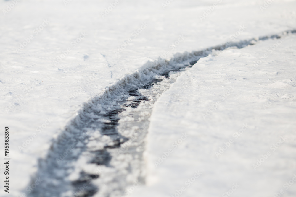 Ice texture. Long crack. Baikal. Winter season