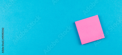 pink post on blue background