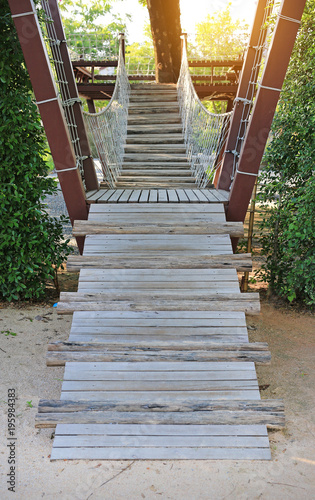 Fototapeta Naklejka Na Ścianę i Meble -  Wooden stairs up the bridge.