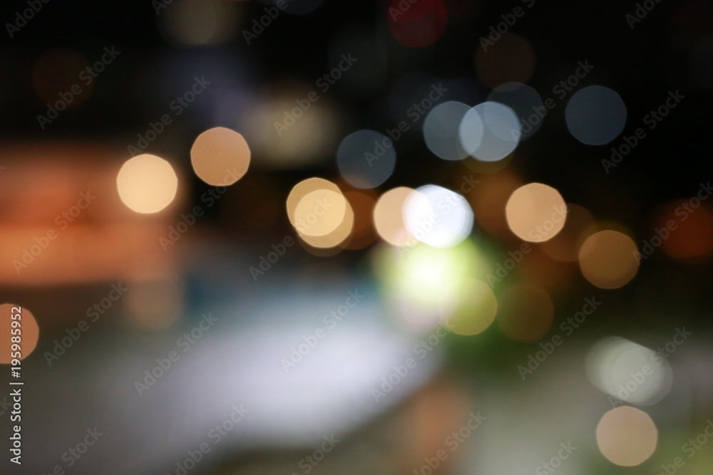 Blurred light of bokeh from car light on the traffic road.