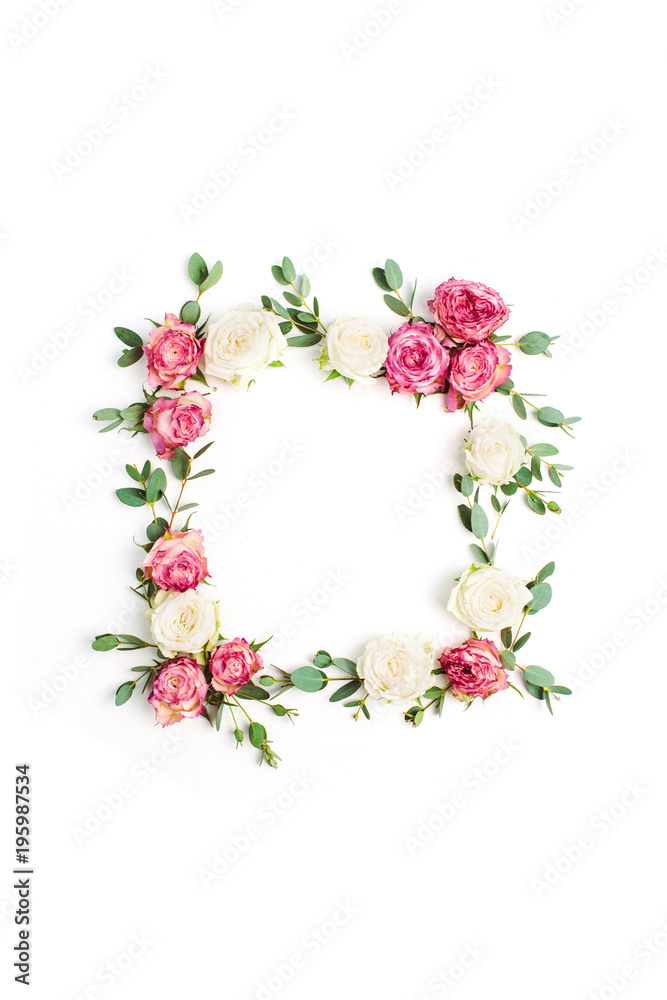 Floral frame wreath made of red and white rose flowers and eucalyptus branches on white background. Flat lay, top view mockup with copy space.