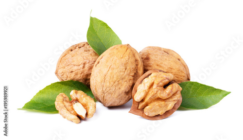 Walnuts with leaves isolated on white background.