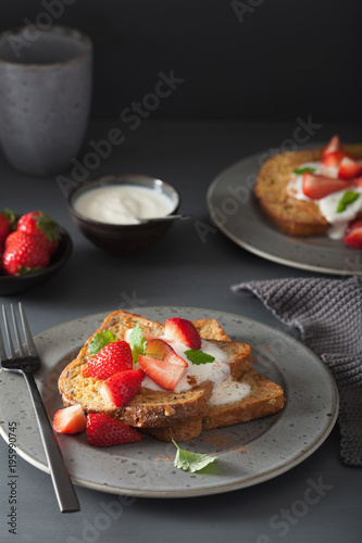 french toasts with yogurt and strawberries for breakfast