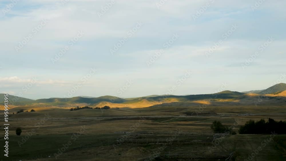 morning field with mountains in Durmitor Park is located in Montenegro morning field with mountains in Durmitor Park is located in Montenegro