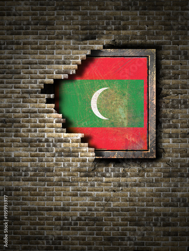 Old Maldives flag in brick wall