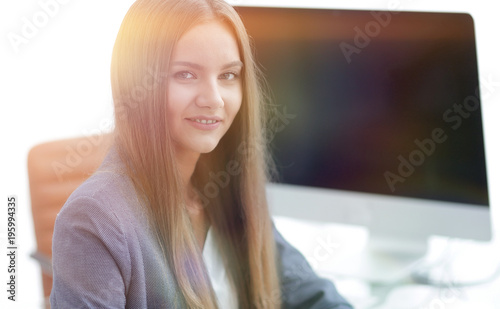 Free Download female office employee sitting at a Desk - GFXLoad