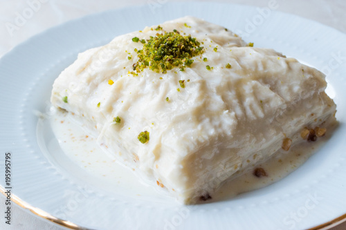 Turkish Milk Dessert Sutlava made with Gullac and Dairy Baklava Dough photo