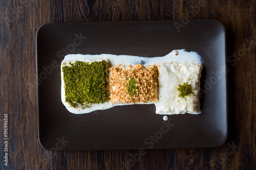 Turkish Milk Dessert Sutlava made with Gullac and Dairy Baklava Dough photo