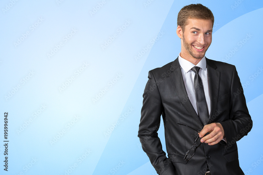 Young handsome businessman smiling Young handsome businessman smiling