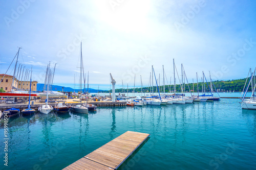 Many boats are resting under beautiful summer sunny day © photo_cruz