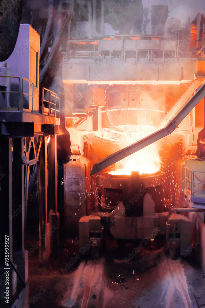 Φωτογραφία Close up of steel-making furnace in smelting steel plant.