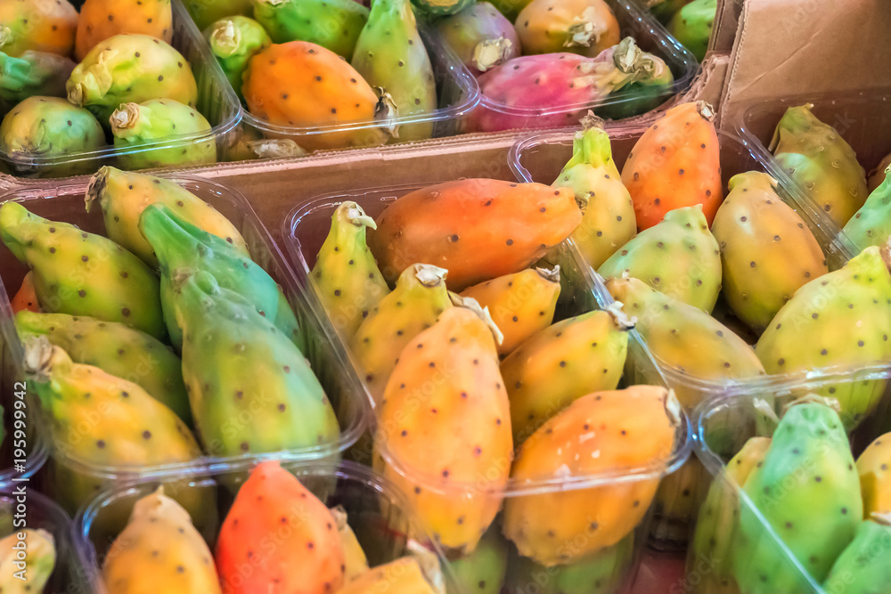 Edible cactus fruits in plastic containers