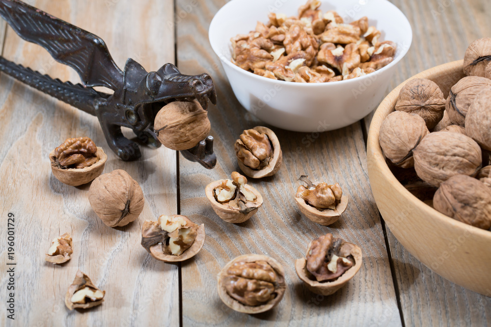 Walnuts on a rustic wooden table Walnuts on a rustic wooden table