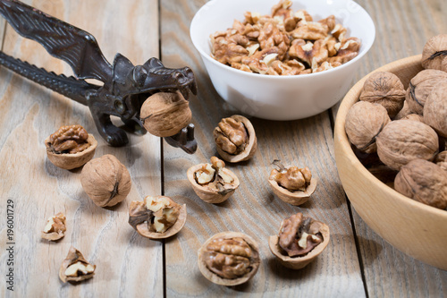 Walnuts on a rustic wooden table