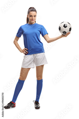 Female soccer player holding a football © Ljupco Smokovski