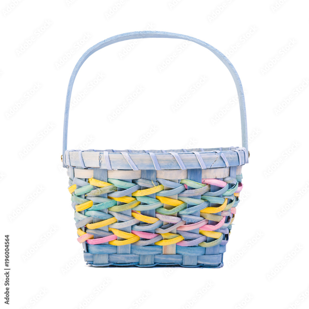 Fototapeta premium Colorful Easter basket on white.