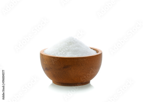 sugar in wood bowl on white background