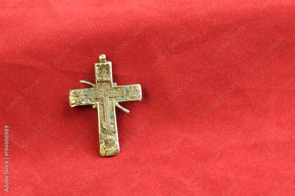 on the red cloth is an ancient religious symbol of the cross Russian old 18th century from copper