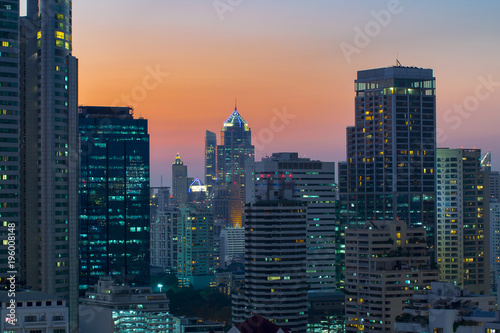 modern office buildings and condominium in Bangkok city downtown with sunset sky and clouds at Bangkok , Thailand. © seksan94