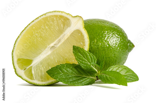  one lime with half of a juicy lime with leaves of mint isolated on white background