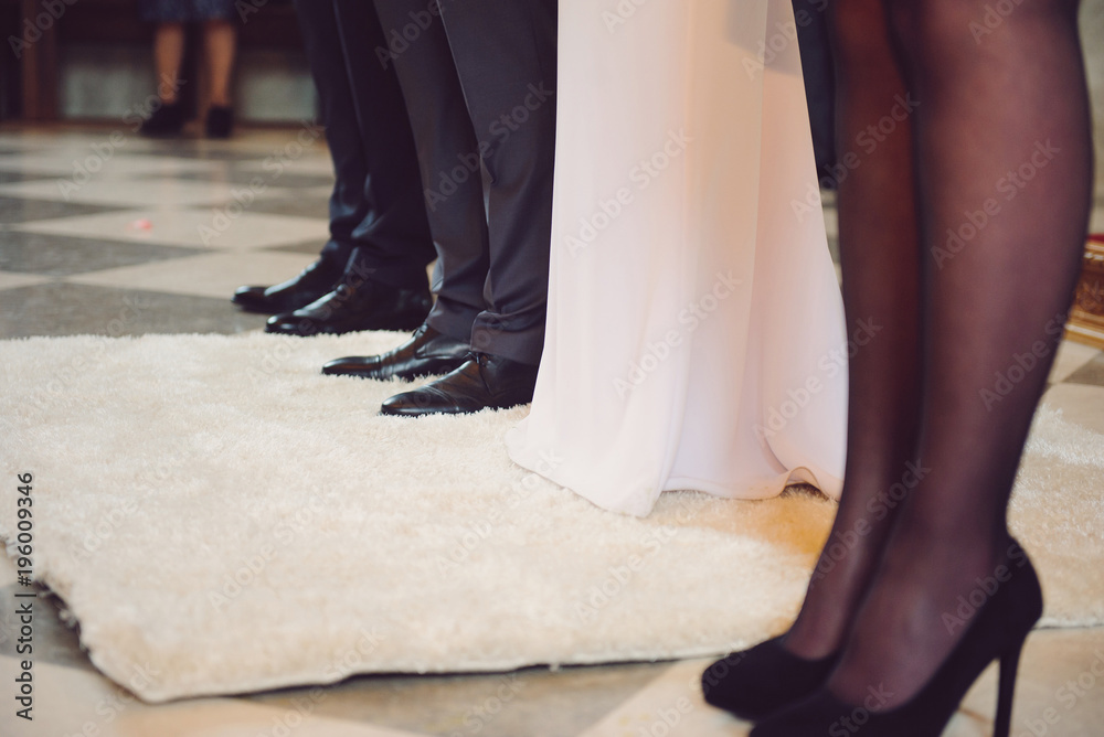 Bride and Groom Standing on Carpet