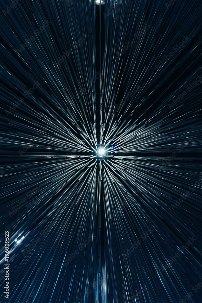 Obraz premium Modern futuristic ceiling in the form of a wave of long tubes with different heights and bright lights from below