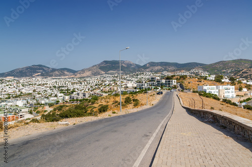 Sunny view of Bodrum from the hill with oldfashioned windmills, Mugla province, Turkey.