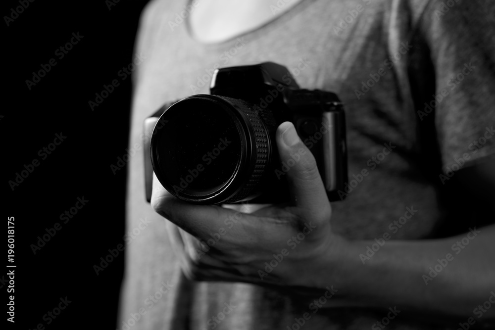 young man with a reflex camera young man with a reflex camera