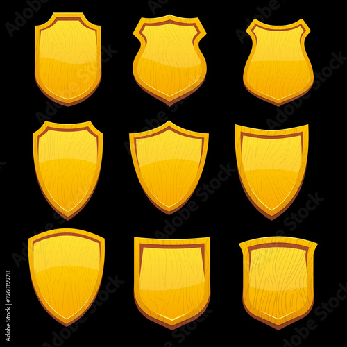 Set of 9 wooden shields of different forms in the style of a cartoon. Shields with highlights isolated on a black background. Vector illustration.