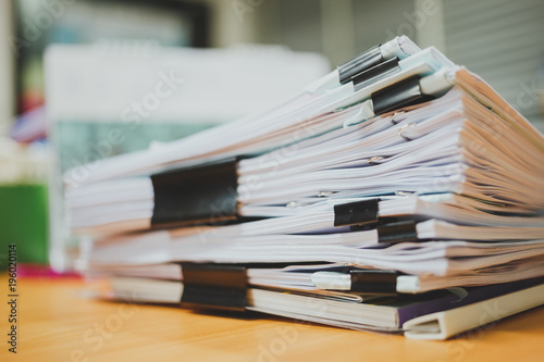 Stack of documents on the desk