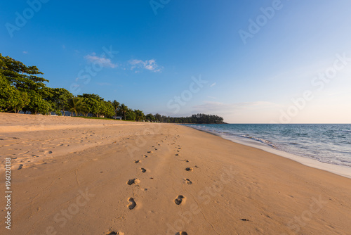 beach sand with footprint near sea in Thailand