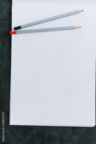 Notepad with pencils mocap. Place for text photo