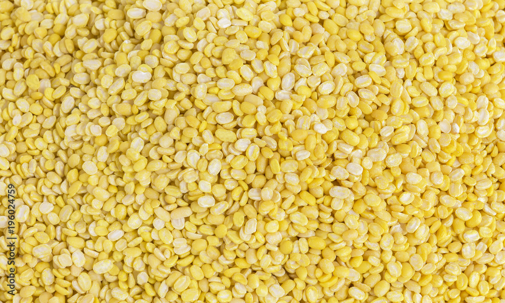 A pile mung dal or moong dal A lot of with copy space for text. Concept food for healthy. Mung dahl dried food ingredient.