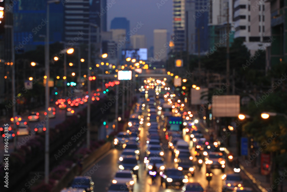 Cars in the movement and abstract bokeh city light background