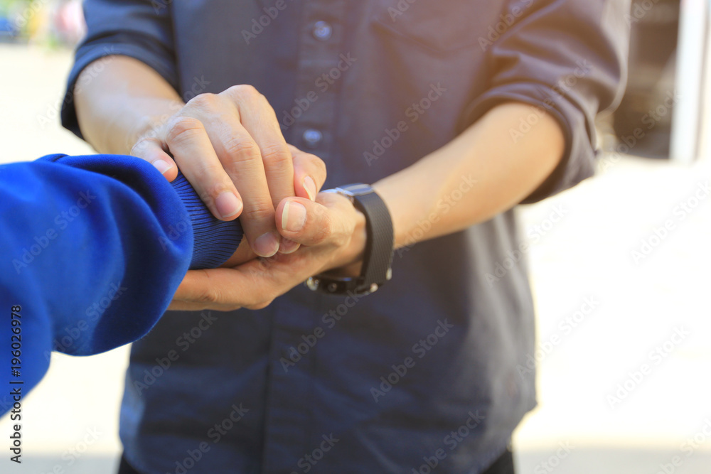 Man and woman holding hands of romantic couple in love, Take care