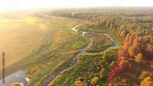 Aerial View. Flying over the beautiful River and beautiful forest.