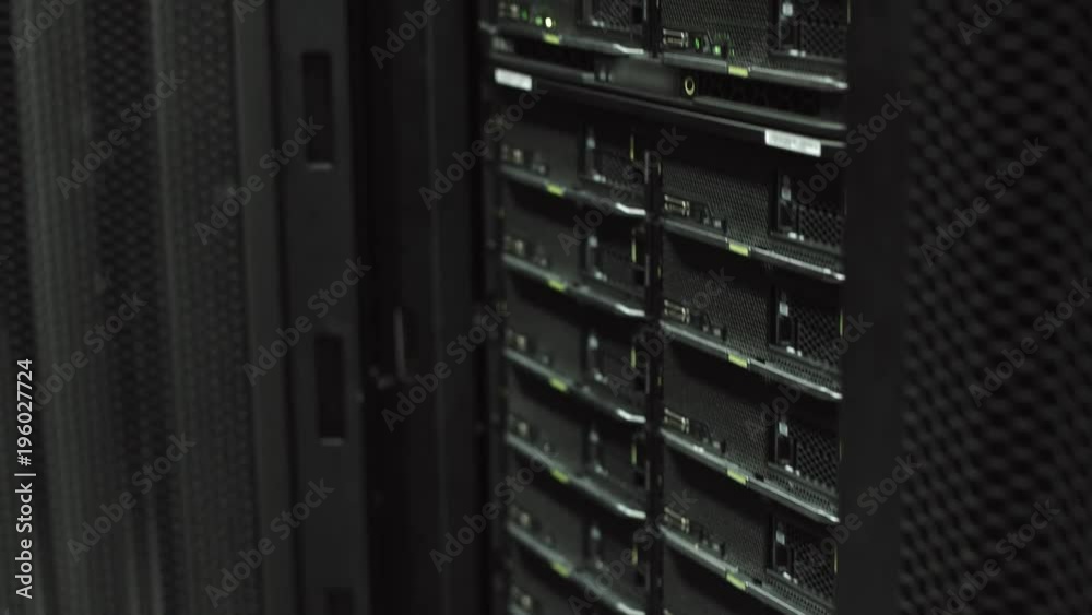 Server engineer opens rack server cabinet Server engineer opens rack server cabinet