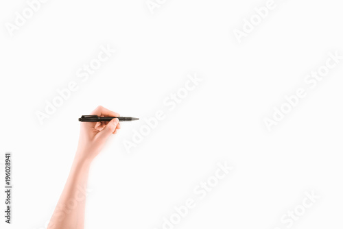 cropped image of lefthanded woman writing something with marker isolated on white photo