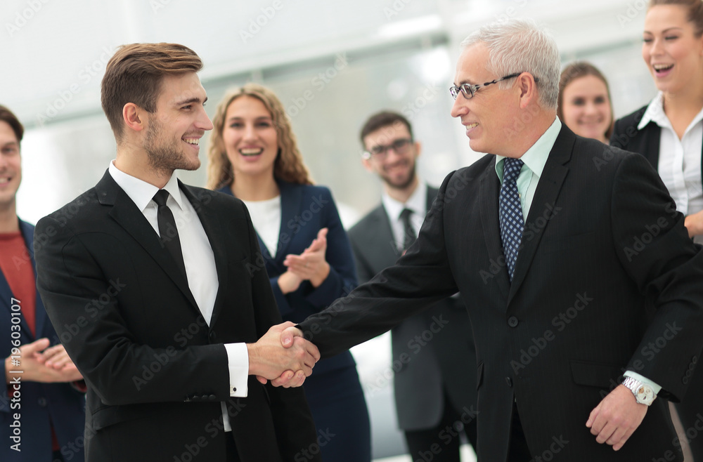 handshake of business partners after a business conference handshake of business partners after a business conference