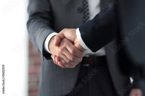Business men giving a handshake. Business concept