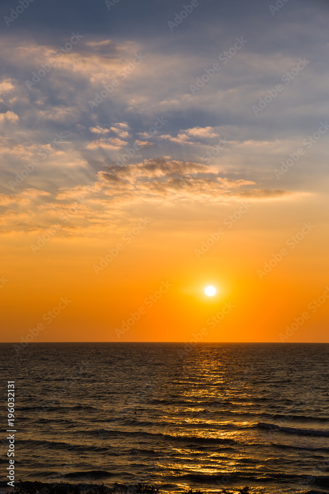 Beautiful yellow Sunset over Adriatic Sea in Italy , Europe